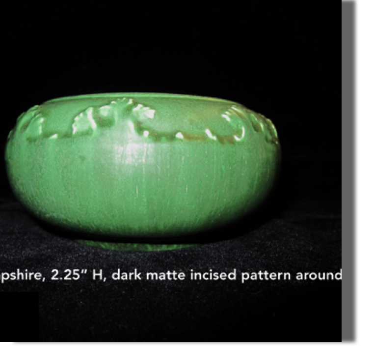 Hampshire pottery, 2.50" high, mat green glaze with incised trees circling pot below rim, very nice example Hampshire pottery, 2.50" high, mat green glaze with incised trees circling pot below rim, very nice example