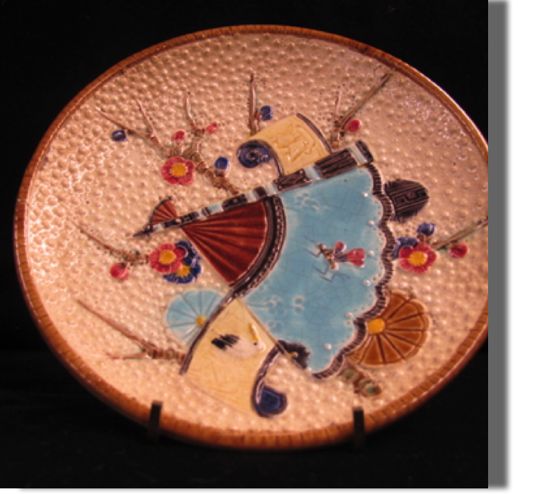 Fan and scroll plate