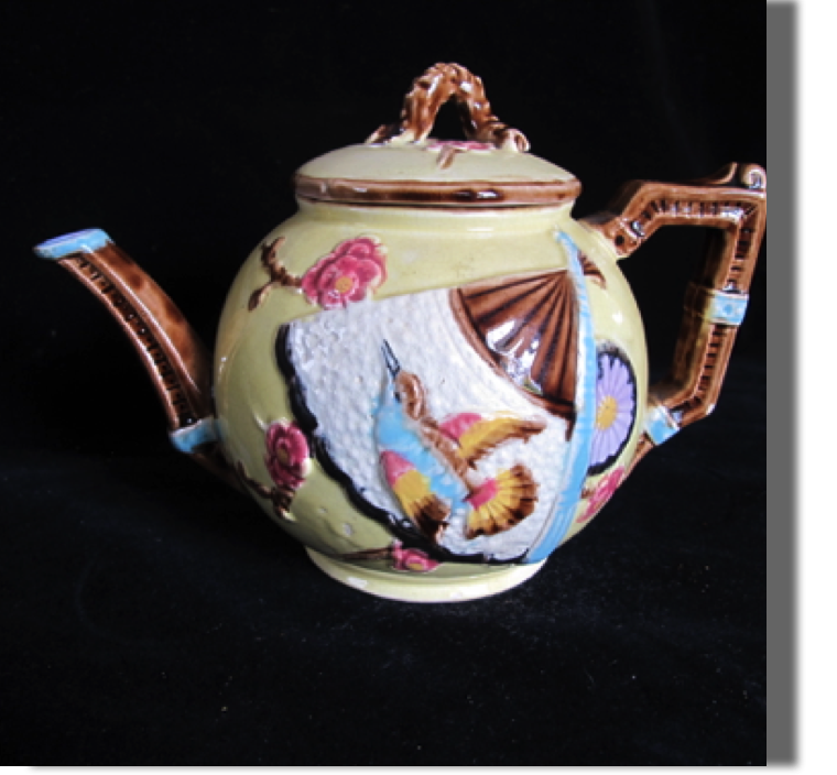 Bird and fan three piece tea set in yellow, also seen in cobalt